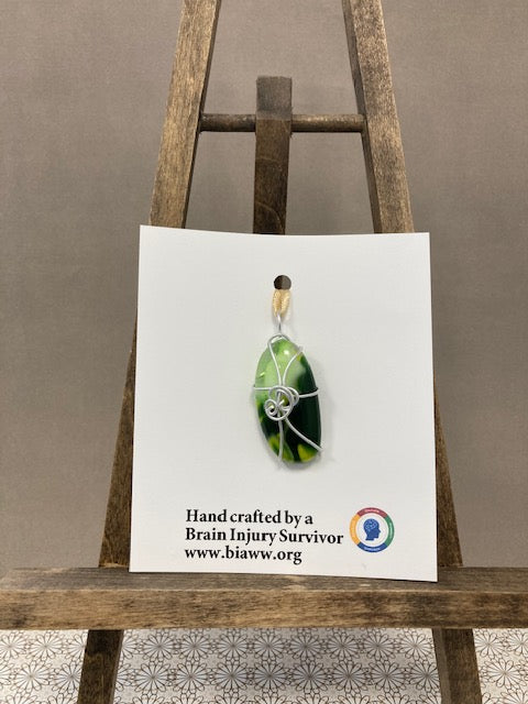 Pendant - Green and yellow oval with silver wire